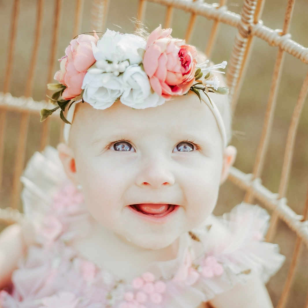 Madelyn joined the competition — help win amazing prizes! accessories, baby, clothing, crib, dress, face, flower, flowerarrangement, flowerbouquet, furniture, happy, hat, head, infantbed, person, petal, photography, plant, portrait, smile