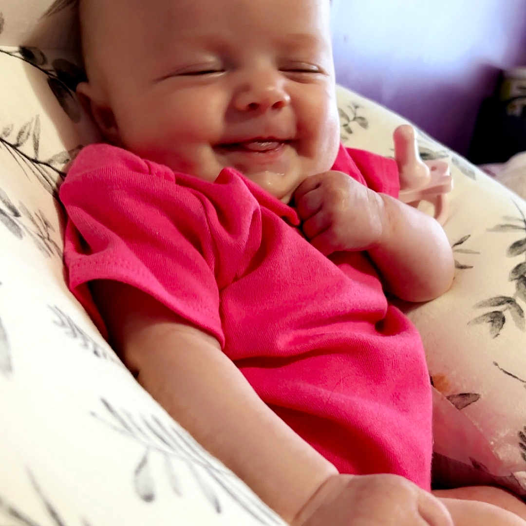 Weslie joined the competition — help win amazing prizes! baby, bed, bedroom, blanket, bodypart, couch, cushion, face, finger, furniture, hand, happy, head, homedecor, newborn, person, photography, portrait, sleeping, smile