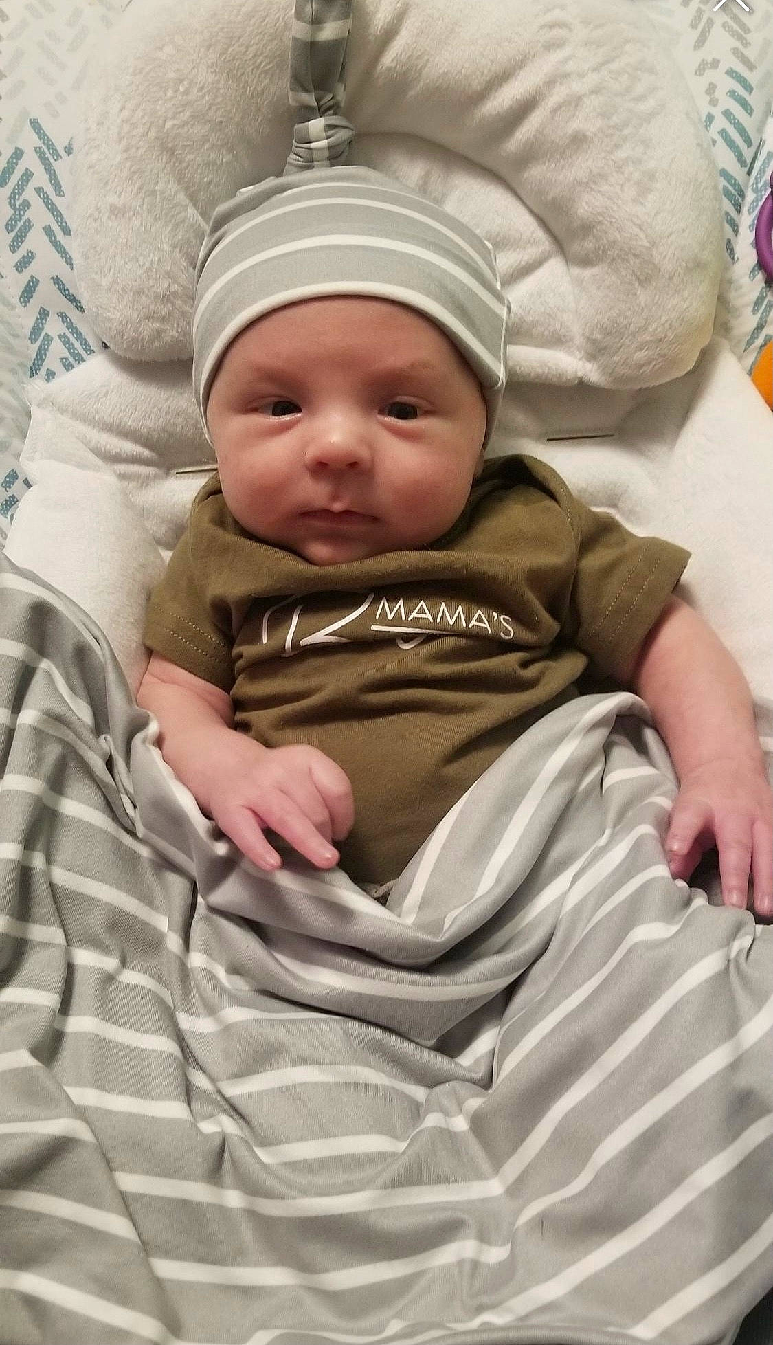 Memphis is registered to the contest to win money with this photo: baby, baby_sleeping, baby_toddler_clothing, cap, cheek, child, comfort, fun, happy, hat, headwear, linens, person, room, sitting, skin, sleeve, toddler