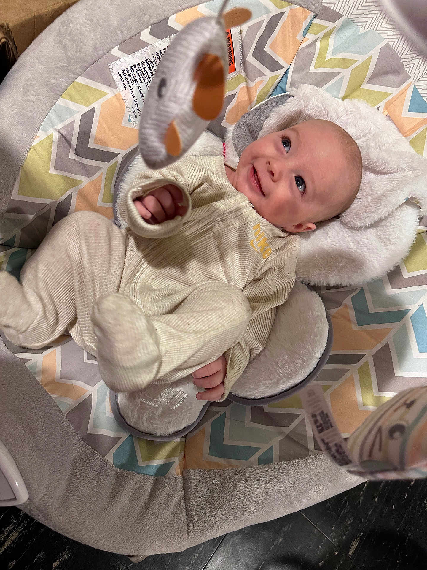 Greyson is registered to the contest to win money with this photo: baby, bed, blanket, bodypart, bonnet, clothing, couch, crib, face, finger, furniture, hat, head, infantbed, knitwear, newborn, person, photography, portrait, sweater