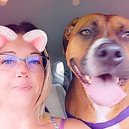 Dixie Rose is registered to the contest to win money with this photo: accessories, adult, animal, bodypart, boxer, bulldog, canine, dog, face, female, finger, glasses, head, hound, mouth, person, pet, photography, portrait, woman