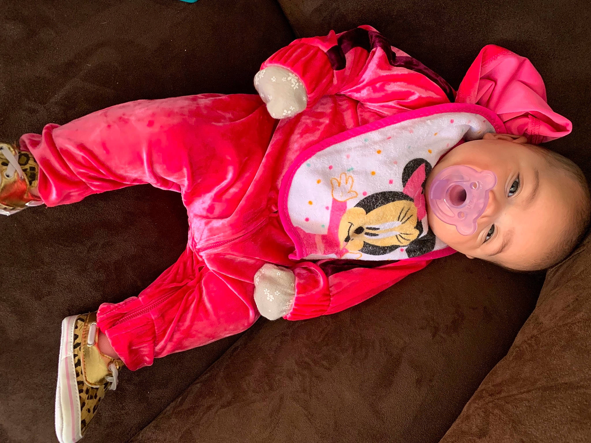 Ellie participe au concours pour gagner de l'argent avec cette photo : baby, baby_products, baby_toddler_clothing, carmine, child, costume, event, fur, hat, jacket, magenta, person, personal_protective_equipment, pink, sitting, sleeve, smile, toddler, tree