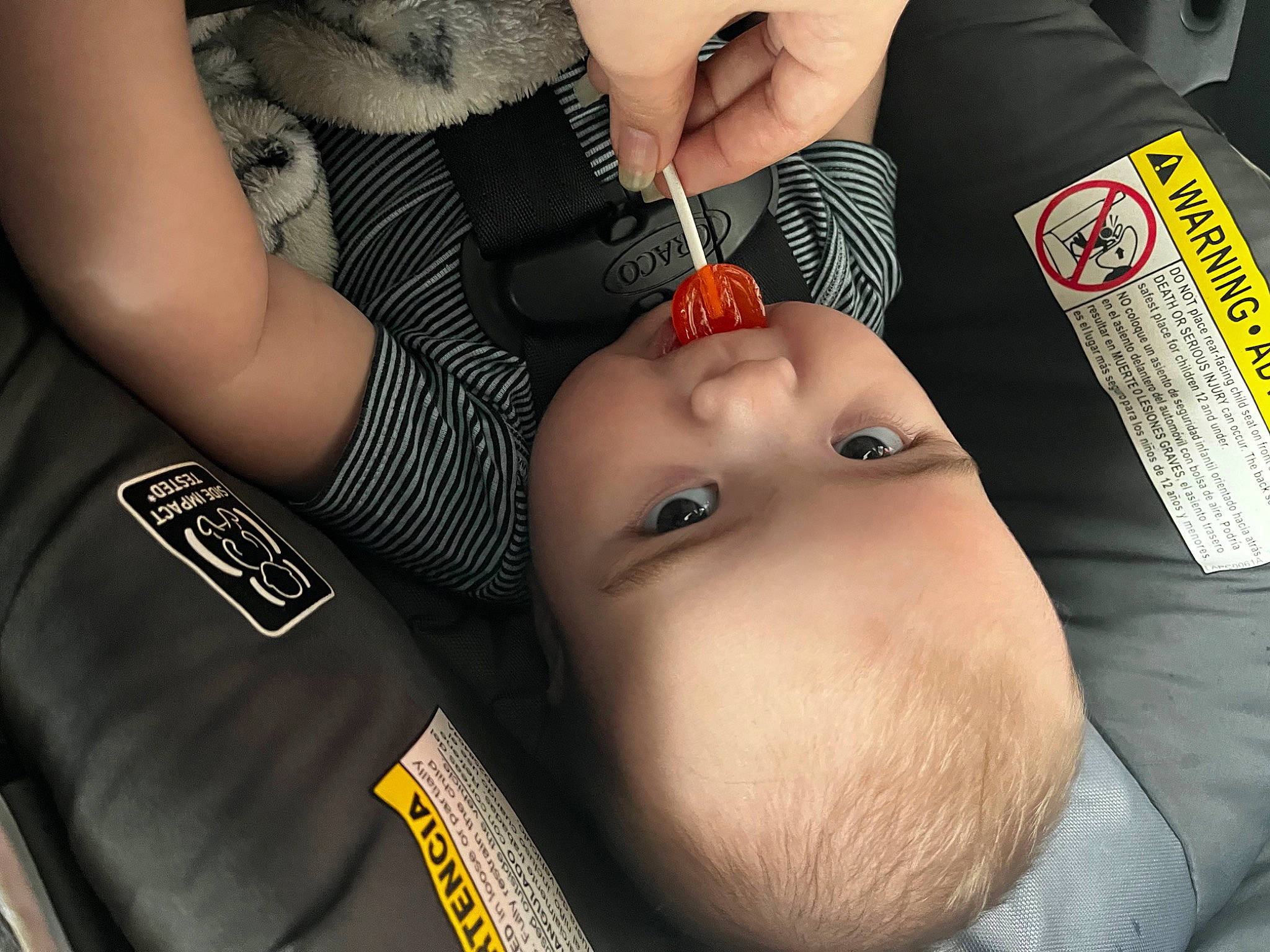 Atticus is registered to the contest to win money with this photo: cheek, chest, cool, elbow, eyelash, eyewear, finger, gesture, hand, happy, human_leg, jaw, lip, mouth, nail, nose, person, skin, thumb, toddler