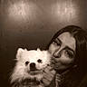 Joy a rejoint le concours — aidez-le/la à gagner de superbes lots ! woman, dog, white_dog, fluffy_dog, portrait, sepia, kiss, affection, face, pet, indoor, closeup, cute, smile, long_hair, looking_at_camera, hand, furry, companion, animal