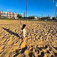Nooreeann joined the competition — help win amazing prizes! child, sand, shadow, outdoor, playground, sunlight, blue_sky, building, barefoot, walking, daytime, recreation, urban, person, summer, leisure, open_space, sky, sunny, environment