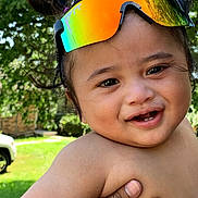 Gm is registered to the contest to win money with this photo: toddler, child, smile, outdoor, sunglasses, happy, face, hand, skin, grass, car, tree, person, portrait, nature, daylight, cheerful, cute, baby, headwear
