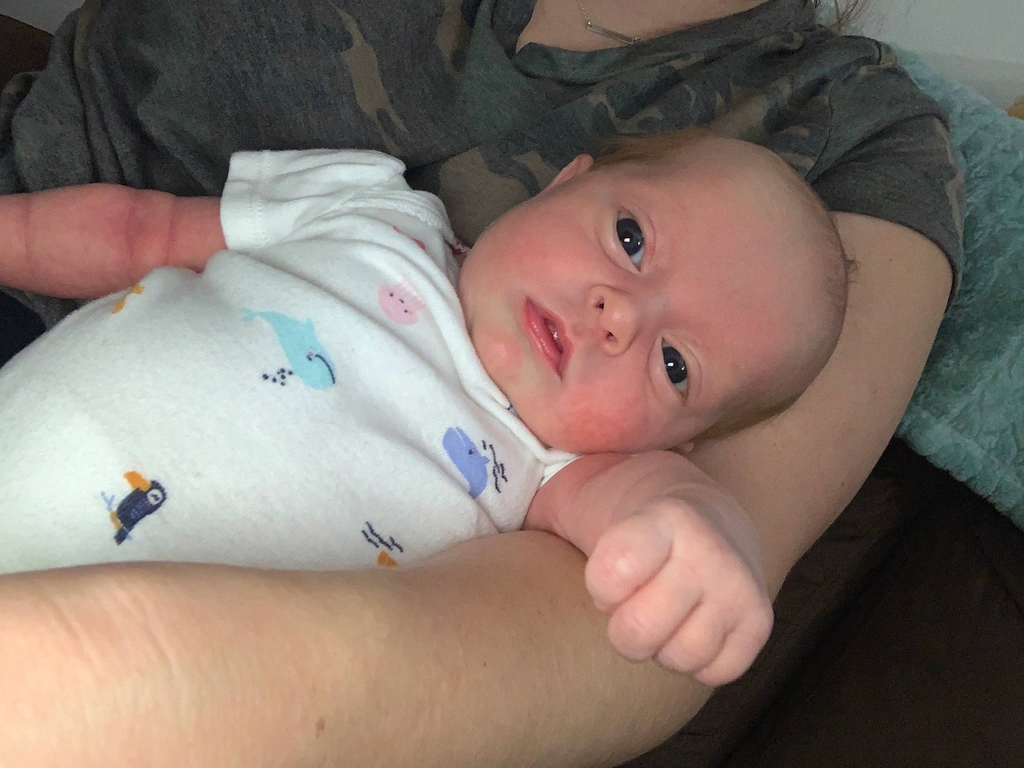 Ariel is registered to the contest to win money with this photo: arm, baby, cheek, child, ear, eye, eyebrow, face, finger, hand, head, leg, lip, mouth, muscle, nose, person, skin, smile, thumb