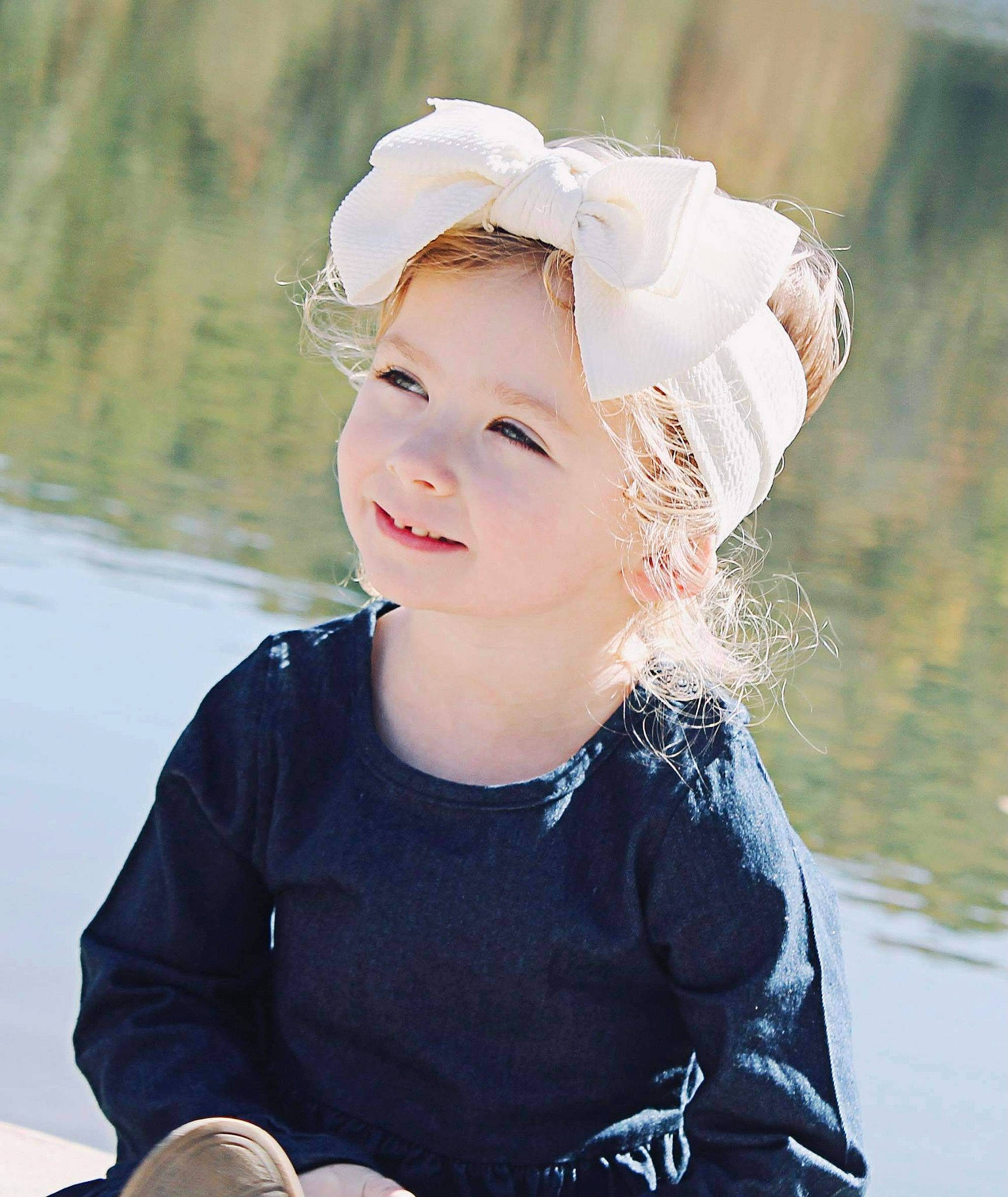 Zaylyn joined the competition — help win amazing prizes! baby_toddler_clothing, cap, child, electric_blue, eye, fashion_accessory, flash_photography, hair_accessory, happy, hat, head, headgear, headpiece, headwear, joy, lake, people_in_nature, person, sleeve, smile