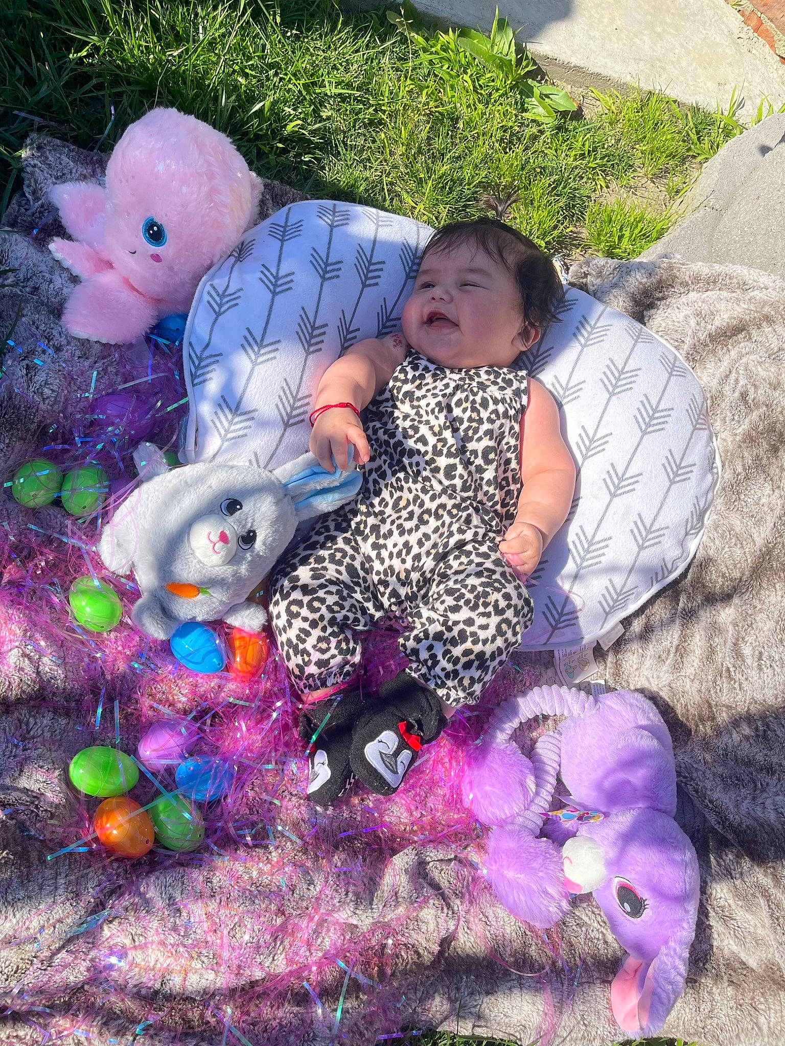 Xitlalli is registered to the contest to win money with this photo: art, baby_toddler_clothing, child, easter, event, fawn, fun, grass, happy, leisure, magenta, pattern, person, pink, plant, purple, recreation, stuffed_toy, toddler, toy
