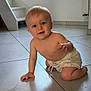 baby, child, crawling, floor, tile, indoor, window, stairs, curious, light, skin, shorts, bare_chest, person, young, infant, home, daylight, expression, cute