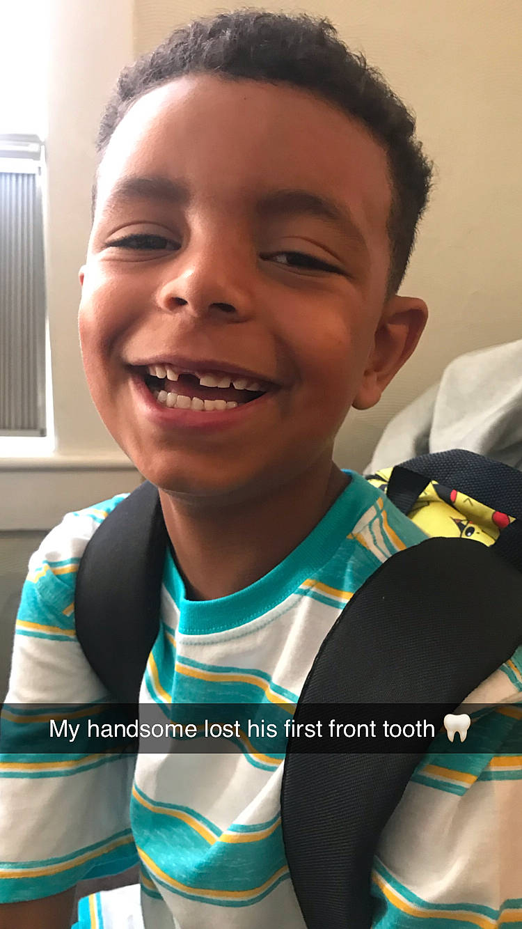 Ky-mani is registered to the contest to win money with this photo: child, chin, ear, eyebrow, face, facial_expression, forehead, happy, head, joy, person, photo_caption, photography, selfie, skin, smile, toddler, tooth