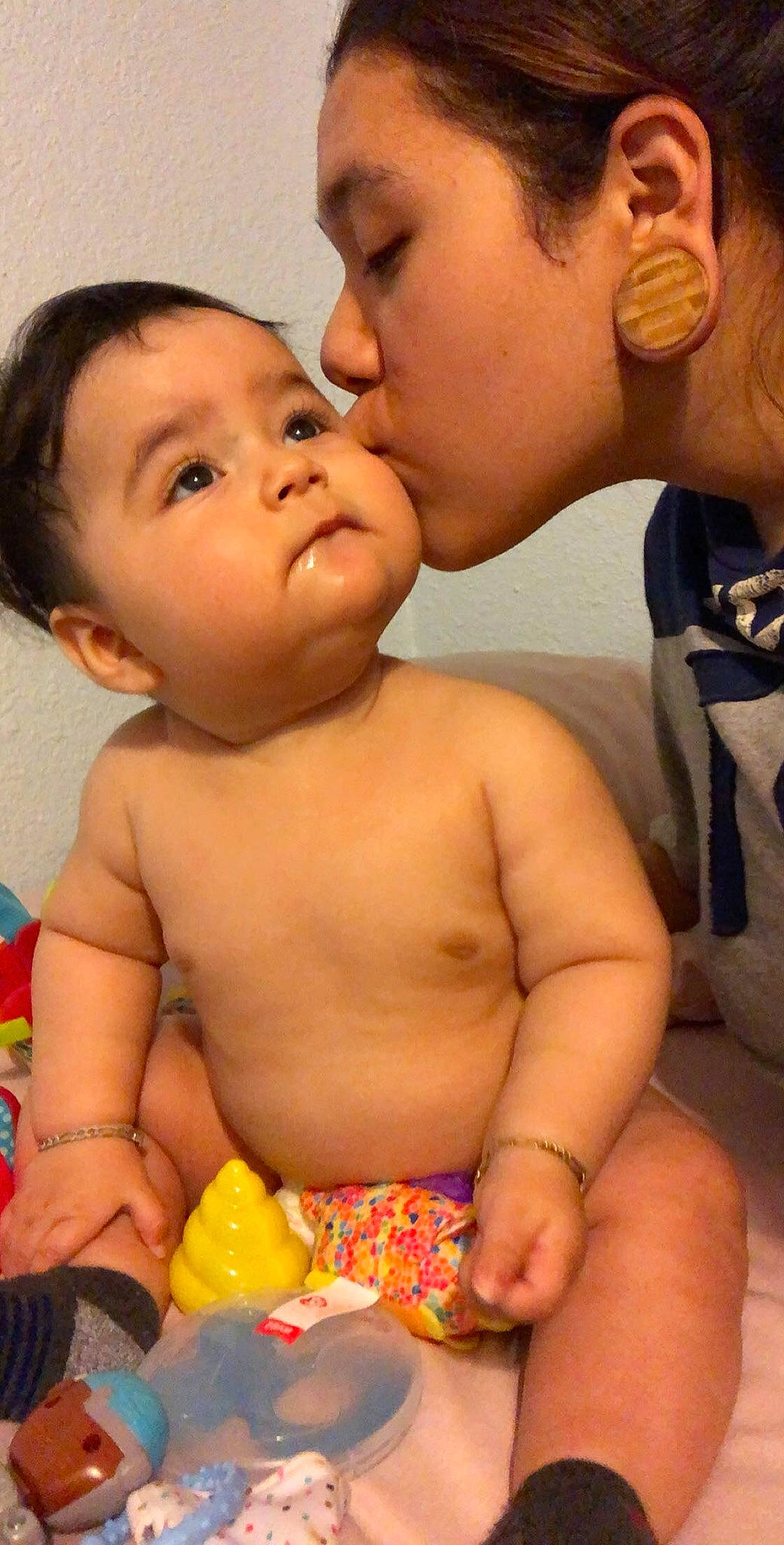 Matteo joined the competition — help win amazing prizes! abdomen, baby, barechested, black_hair, cheek, chest, child, finger, gesture, interaction, lip, mother, mouth, muscle, neck, nose, person, skin, thumb, toddler