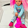Allysson joined the competition — help win amazing prizes! toddler, child, pajamas, pink_crocs, pink_fabric, floor, marble_floor, indoor, cute, childrens_clothing, sitting, holding, playful, funny_hat, bright_colors, curious_expression, person, young_child, footwear, home