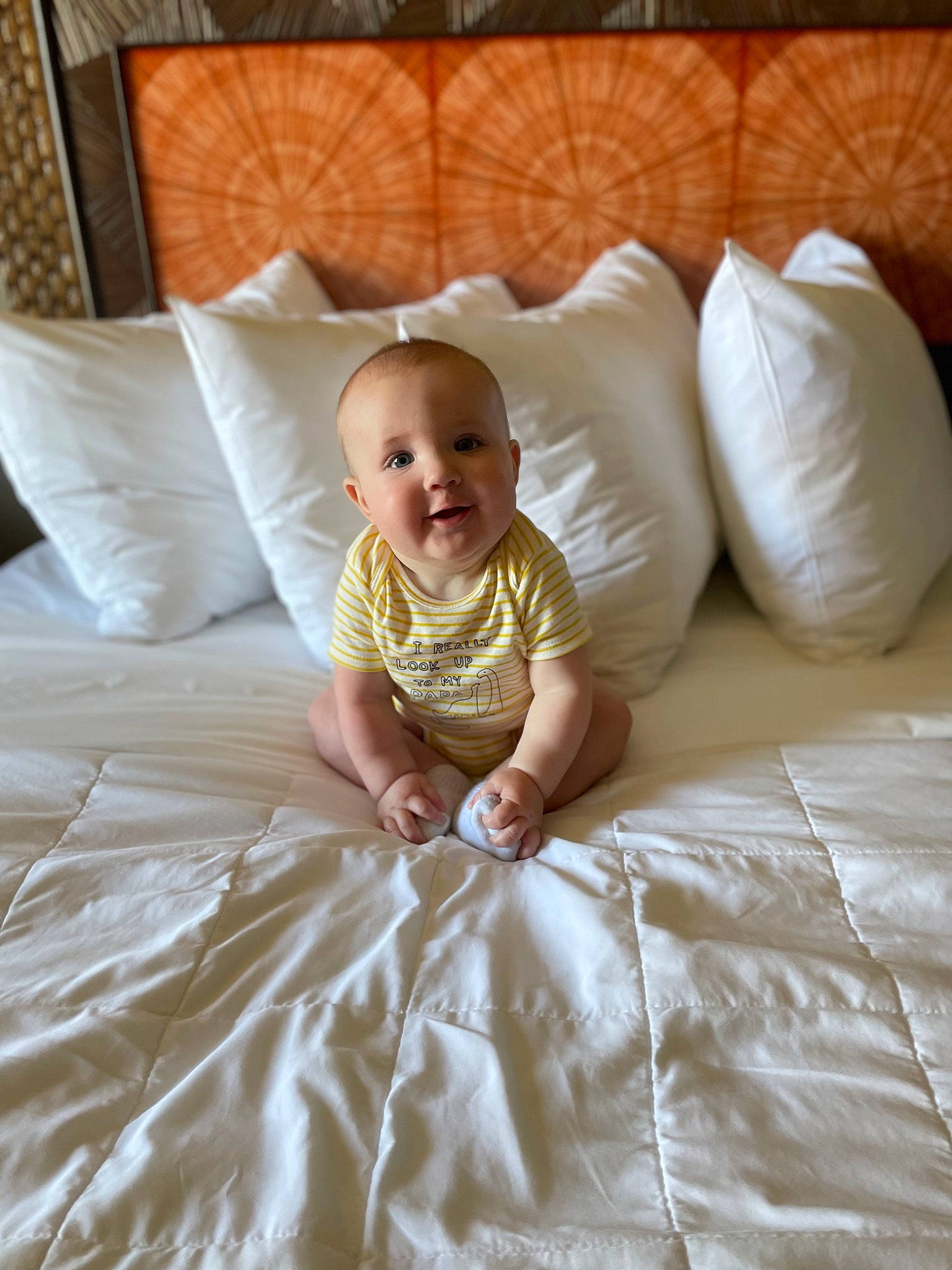 Van is registered to the contest to win money with this photo: baby, baby_toddler_clothing, beauty, bedding, bedroom, child, comfort, floor, flooring, furniture, hairstyle, hardwood, linens, mammal, person, product, skin, smile, textile, toddler