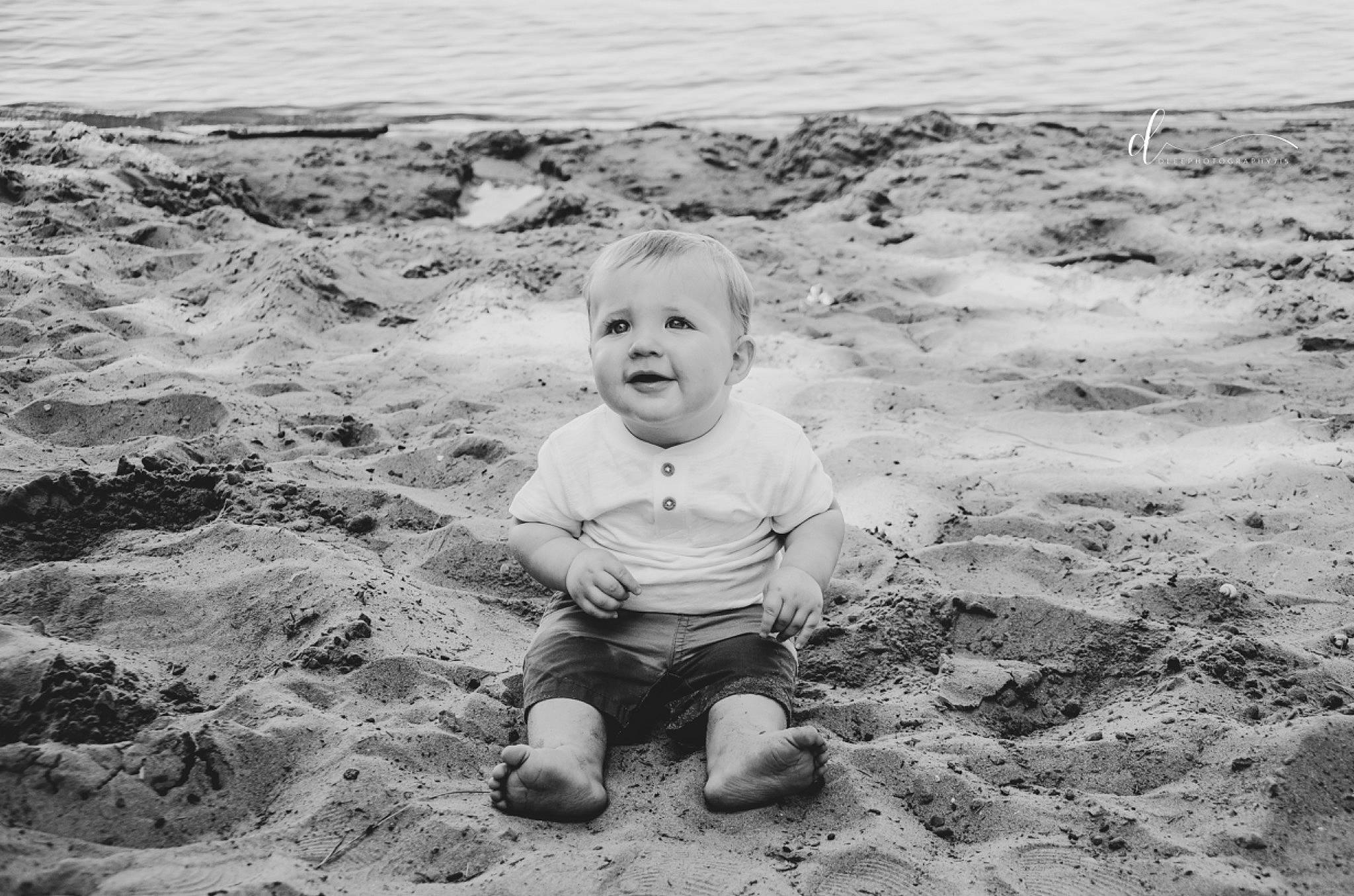Van is registered to the contest to win money with this photo: baby, beach, black_and_white, child, face, fun, grass, happy, landscape, monochrome, monochrome_photography, people_in_nature, person, sand, shore, smile, standing, style, toddler, water