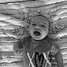Remi joined the competition — help win amazing prizes! baby, black_and_white, blanket, cheerful, closeup, clothing, cute, face, happy, heart_shaped_candies, infant, infant_clothing, joy, love, lying_down, onesie, portrait, smiling, sweet, texture
