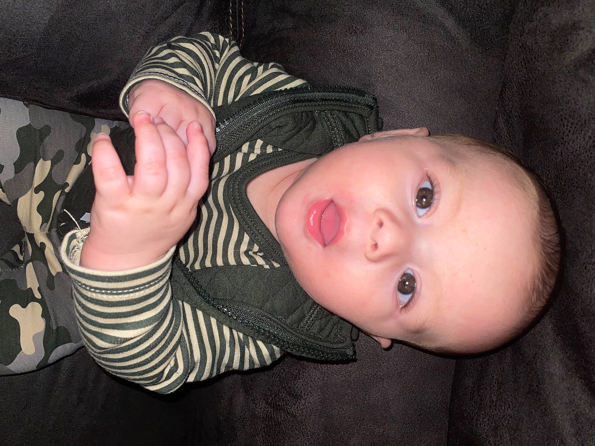 Brantlee is registered to the contest to win money with this photo: arm, baby, baby_toddler_clothing, cheek, cool, eyebrow, eyelash, finger, flash_photography, gesture, hairstyle, hand, headgear, human_body, lip, mouth, neck, nose, person, skin