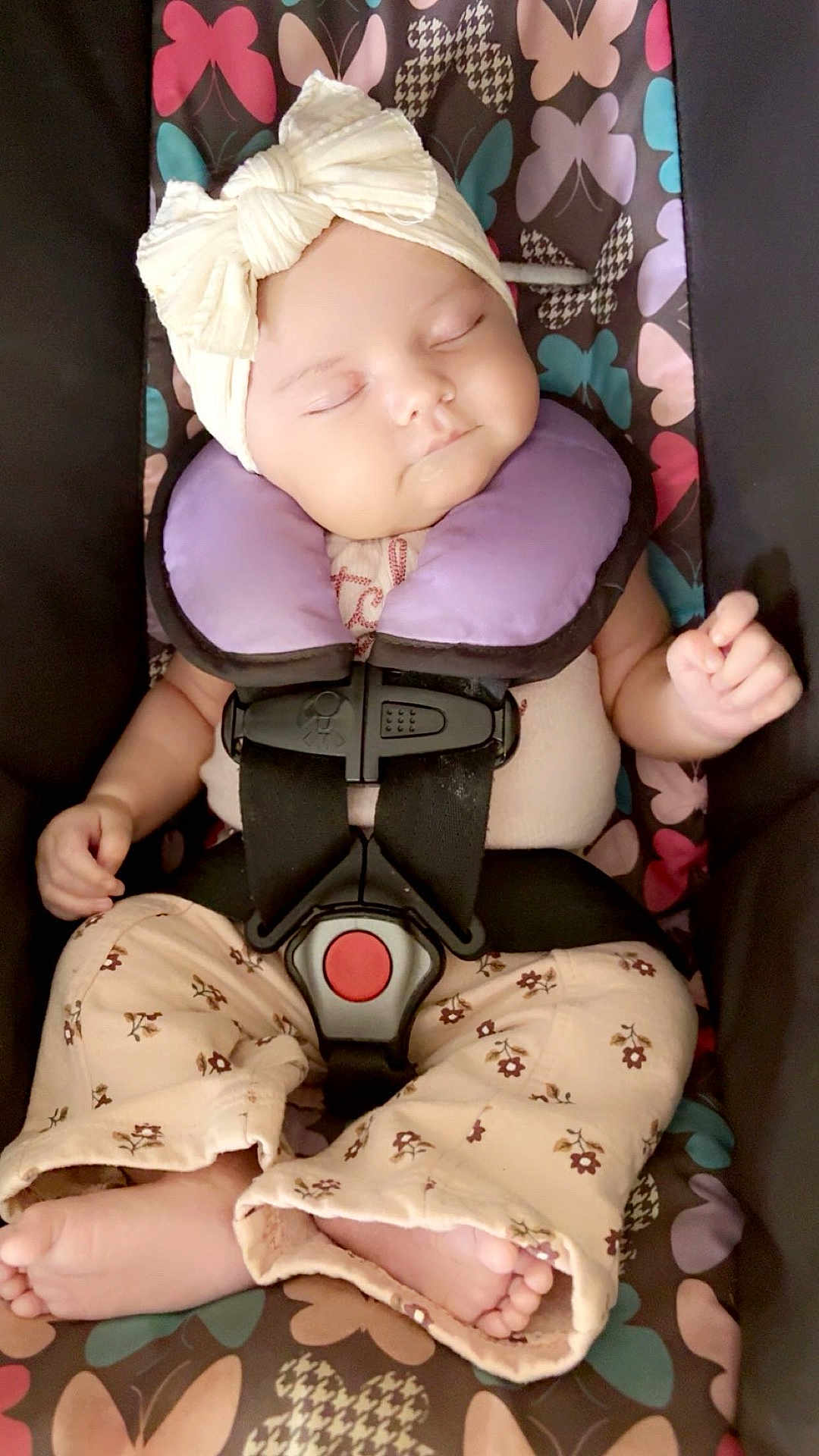 Alessandra joined the competition — help win amazing prizes! baby, sleeping, headband, bow, car_seat, neck_pillow, pajamas, footwear_free, infant, child, patterned, butterfly, floral, colorful, cute, peaceful, portrait, indoors, resting, soft