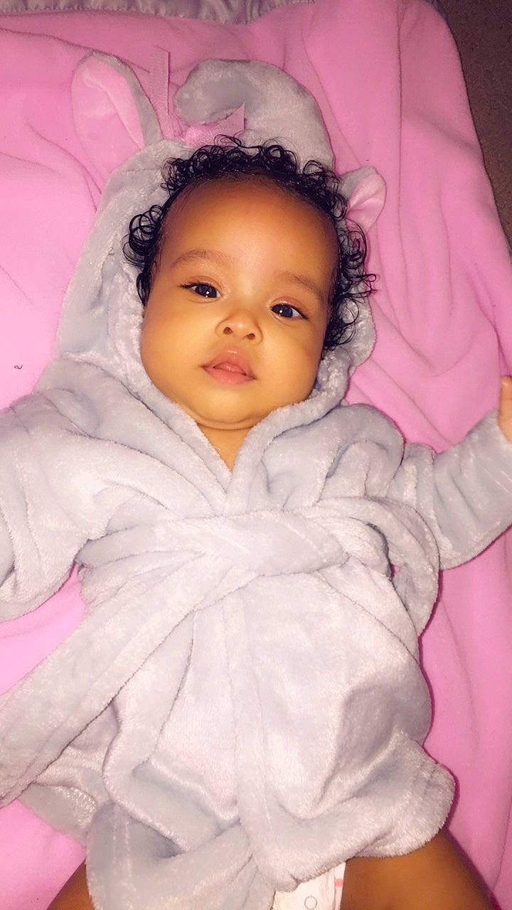 Amirah is registered to the contest to win money with this photo: baby, cheek, child, eye, face, head, iris, lip, nose, person, pink, product, skin, smile, textile, toddler