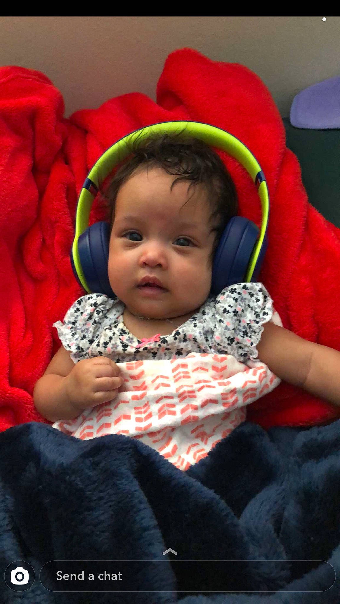 Amirah is registered to the contest to win money with this photo: baby, baby_in_car_seat, car_seat, cheek, child, ear, electronic_device, person, toddler
