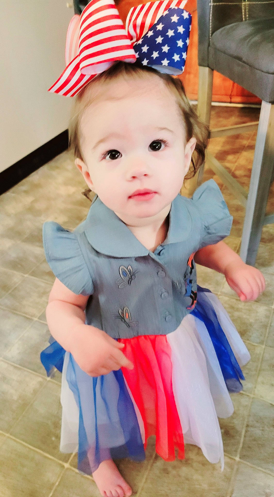 Ada is registered to the contest to win money with this photo: baby, baby_toddler_clothing, blue, cap, chin, clothing, costume_hat, dress, eye, face, facial_expression, happy, hat, head, party_hat, person, pink, skin, sleeve, sun_hat