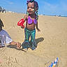 Shavena joined the competition — help win amazing prizes! child, beach, sand, toy, mermaid_costume, purple_bow, braided_hair, sunny, blue_sky, playful, outdoor, summer, child_playing, casual_clothing, footwear, person, holiday, vacation, fun, daytime