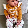 toddler, child, baby, sitting, couch, clothing, headband, mustard_yellow, floral, pants, long_sleeve, indoors, portrait, cute, baby_fashion, social_media, story, expression, face, feet