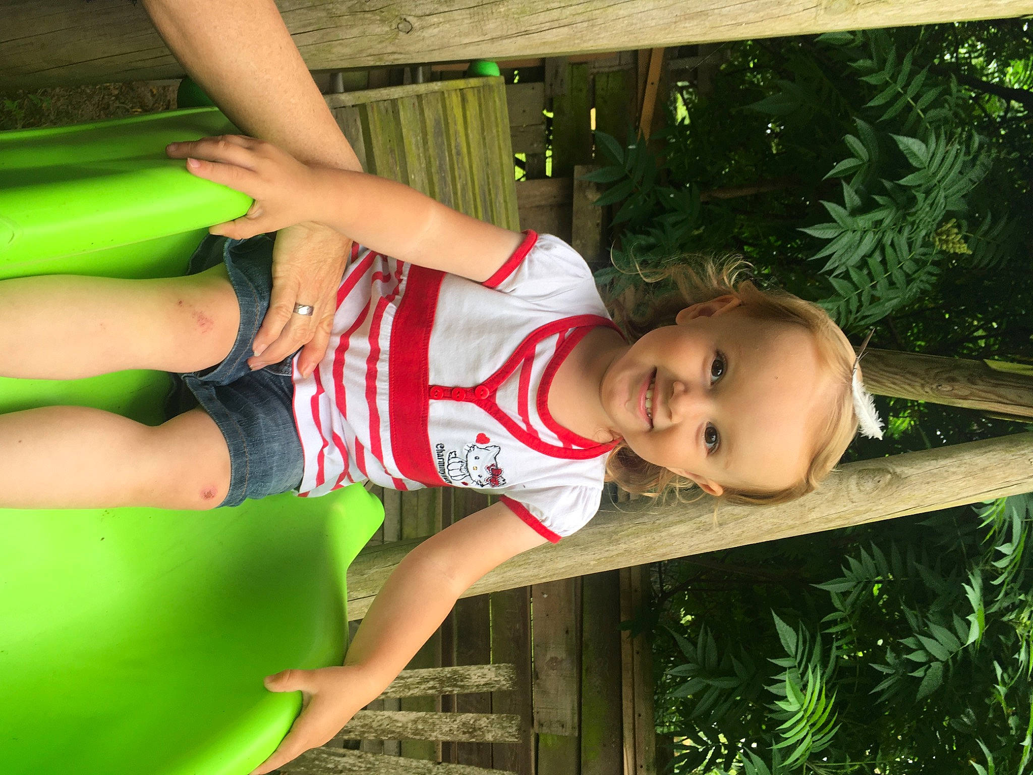 Jade participe au concours pour gagner de l'argent avec cette photo : abdomen, chest, elbow, fun, grass, happy, human_body, human_leg, joy, knee, leisure, organ, people_in_nature, person, plant, shorts, thigh, toddler, tree, trunk