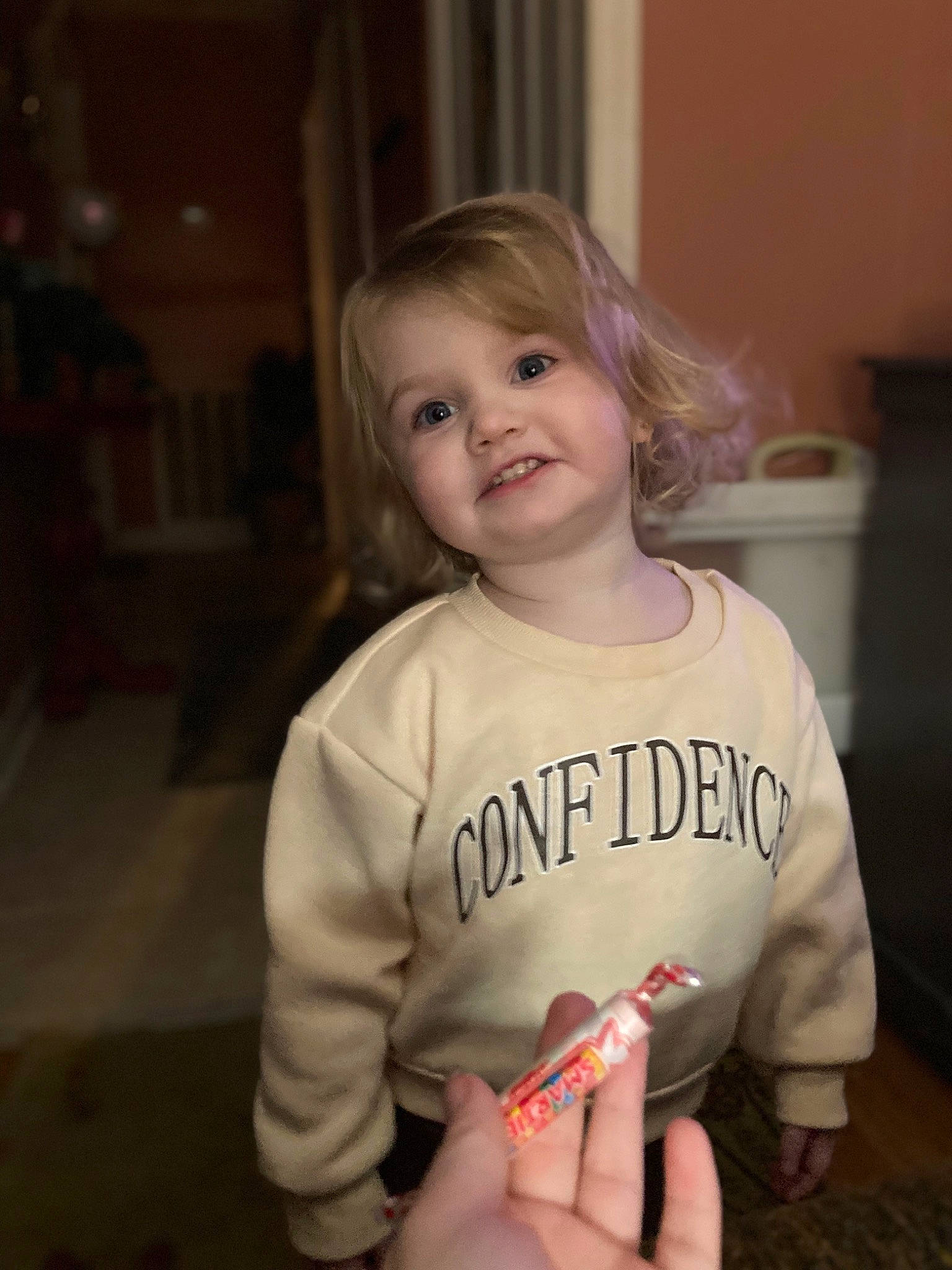 Annlee is registered to the contest to win money with this photo: baby_toddler_clothing, blond, carmine, cheek, child, chin, eye, face, flooring, fun, gesture, hairstyle, happy, iris, joy, person, skin, sleeve, smile, t_shirt