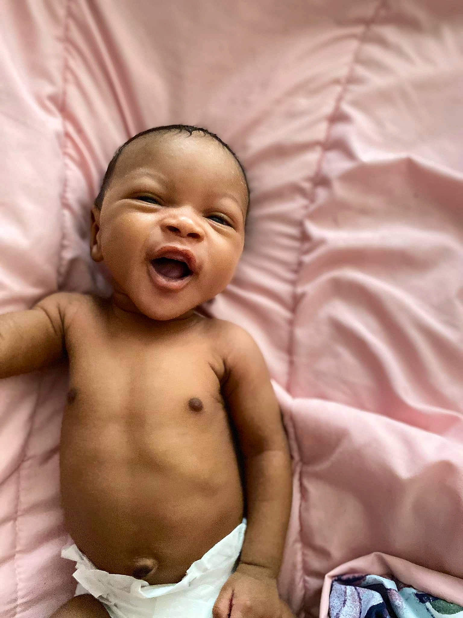 Montrez is registered to the contest to win money with this photo: baby, cheek, chin, comfort, eye, eyebrow, face, gesture, happy, head, human_body, lip, mouth, nose, person, skin, smile, thumb, toddler, tooth