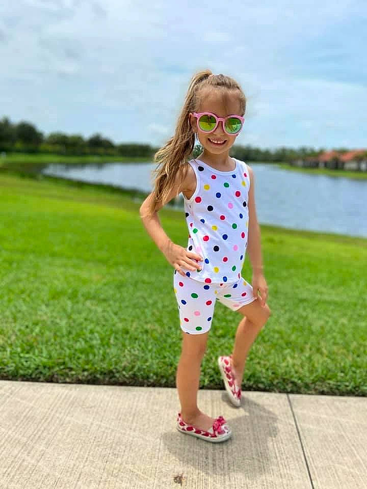 Alessia joined the competition — help win amazing prizes! baby_toddler_clothing, cloud, dress, eyewear, fun, glasses, grass, hairstyle, happy, joy, leisure, people_in_nature, person, plant, recreation, sky, sleeve, smile, street_fashion, sunglasses
