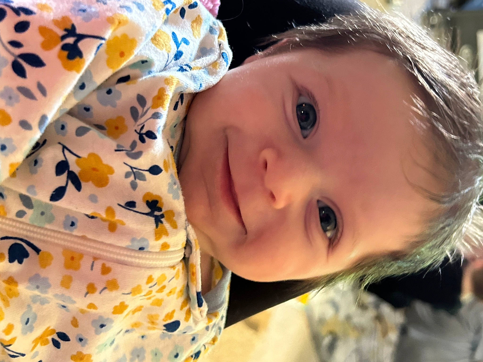 Hadlee is registered to the contest to win money with this photo: cheek, child, eyelash, face, grass, happy, iris, joy, leaf, leisure, lip, mammal, nose, organ, people, person, plant, skin, smile, toddler