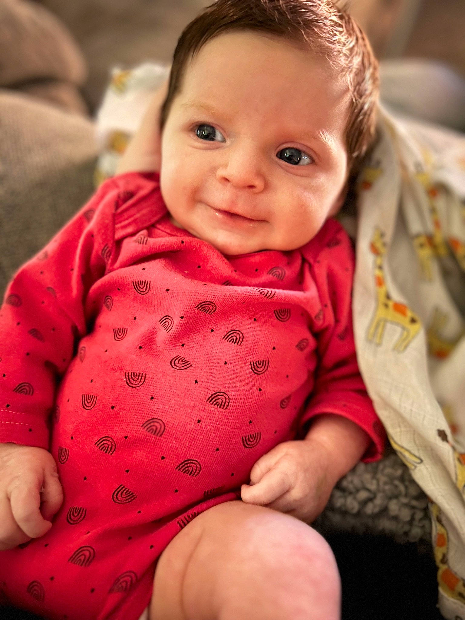 Hadlee is registered to the contest to win money with this photo: abdomen, baby, baby_toddler_clothing, cheek, chin, comfort, face, finger, gesture, happy, head, human_body, lip, nose, person, skin, sleeve, smile, stomach, toddler