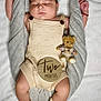 Alvaro joined the competition — help win amazing prizes! baby, bed, blanket, clothing, crib, cushion, face, furniture, glove, head, homedecor, hosiery, newborn, person, photography, portrait, sleeping, sock, teddybear, toy