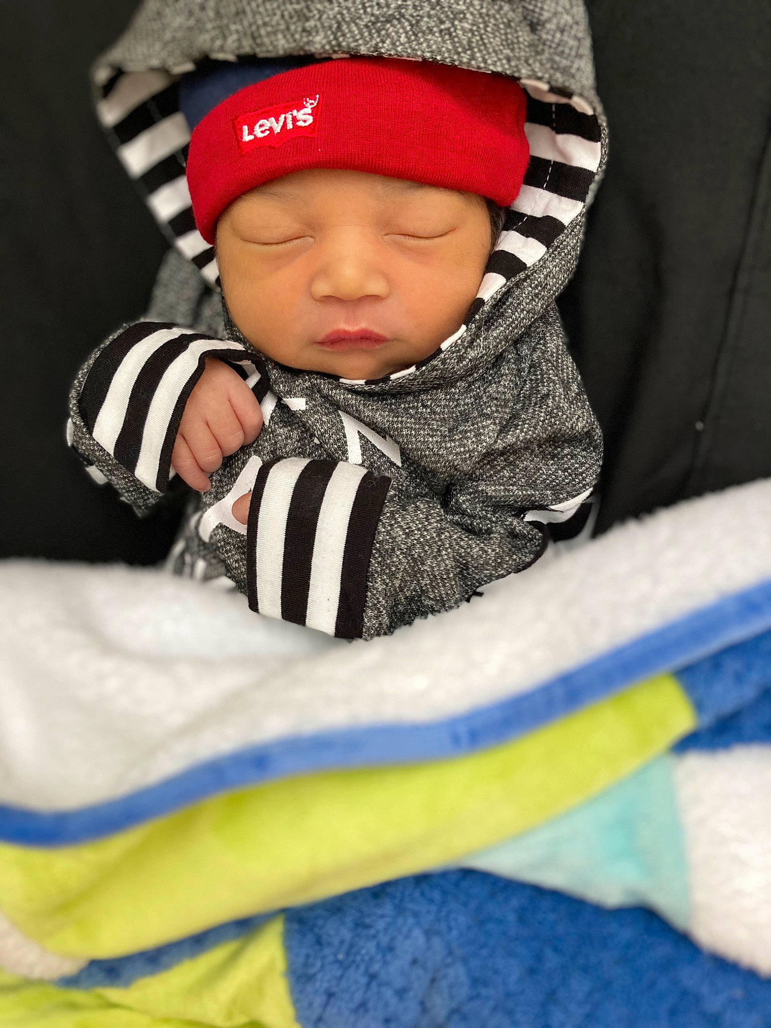 Messiah joined the competition — help win amazing prizes! baby, baby_carriage, baby_products, baby_toddler_clothing, beanie, cap, carmine, child, comfort, electric_blue, face, fashion_accessory, fun, happy, headwear, jacket, knit_cap, outerwear, person, sleeve