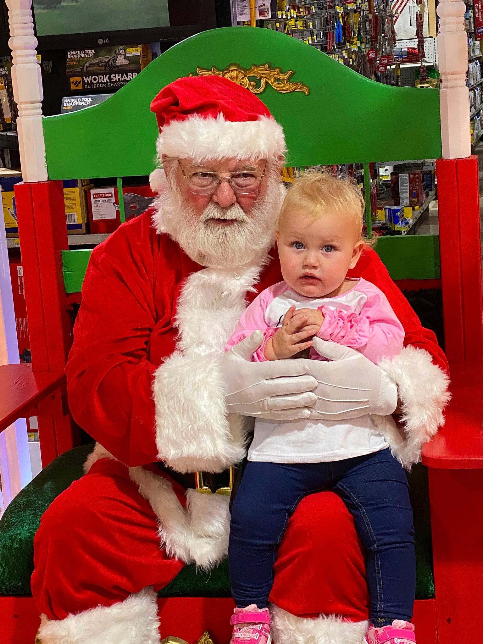 Kaylie is registered to the contest to win money with this photo: christmas, christmas_eve, facial_hair, fictional_character, happy, headwear, holiday, lap, person, santa_claus