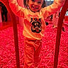 Arabella joined the competition — help win amazing prizes! child, girl, toddler, smiling, happy, portrait, playground, indoor, foam_pit, pink, red, play_structure, play_area, long_sleeves, pants, ponytails, raccoon_shirt, window, reflection, playful