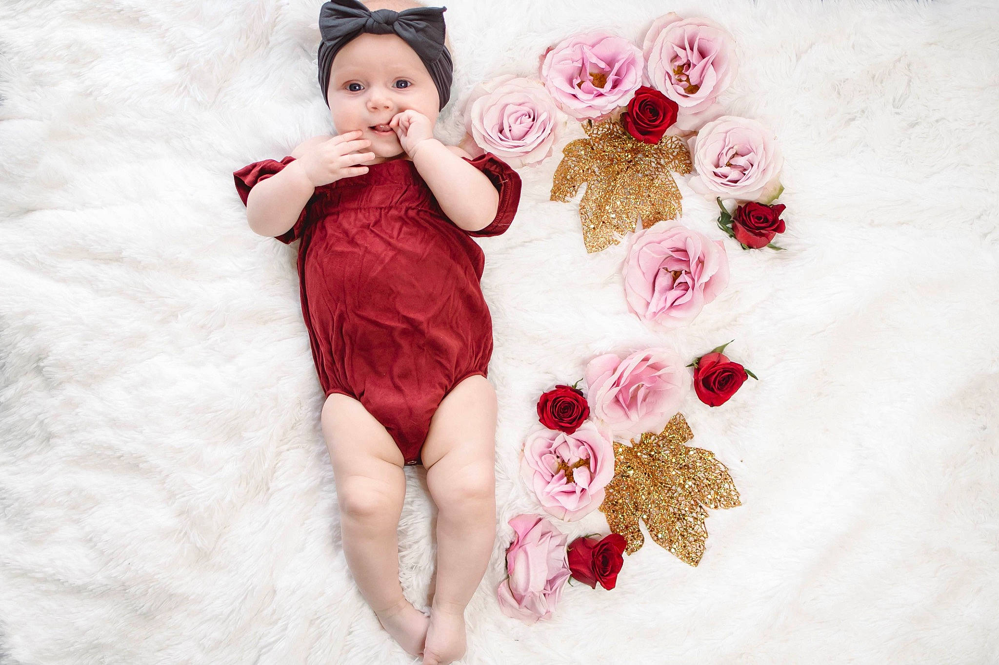 Autumn is registered to the contest to win money with this photo: baby, child, child_model, flower, headwear, illustration, leg, person, petal, photography, pink, plant, red, rose, textile, toddler