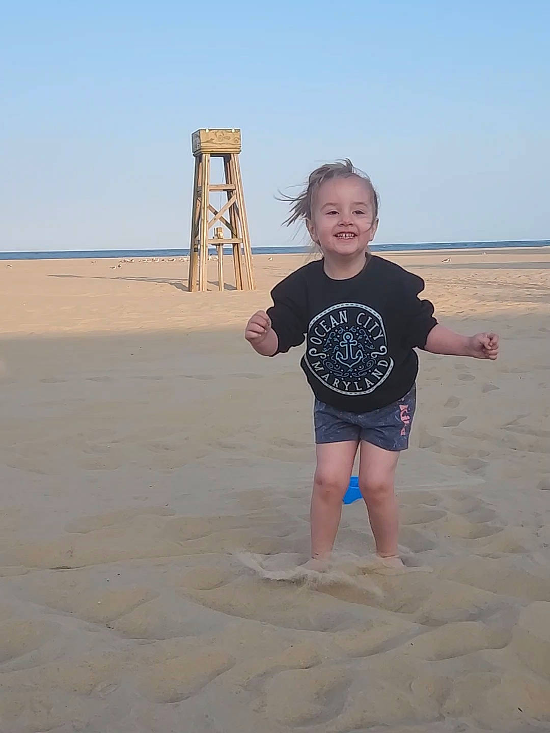 Cambria joined the competition — help win amazing prizes! aeolian_landform, barefoot, beach, child, fun, gesture, happy, hat, horizon, joy, landscape, people_in_nature, person, sand, singing_sand, sky, sleeve, smile, t_shirt, thumb