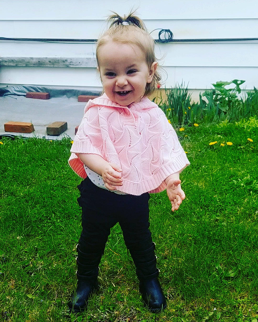 Cambria is registered to the contest to win money with this photo: baby, child, dress, footwear, grass, green, happy, head, joy, outerwear, pattern, people, person, pink, plant, play, skin, smile, spring, standing
