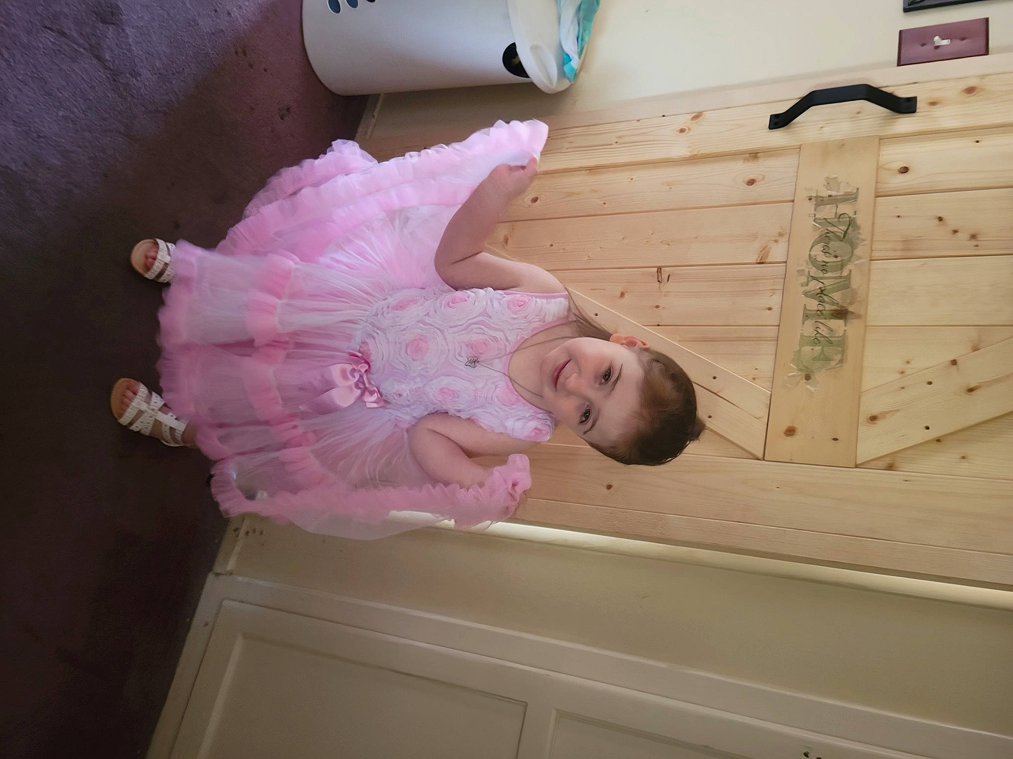 Siddalee is registered to the contest to win money with this photo: baby, baby_products, baby_toddler_clothing, box, child, drawer, eye, finger, fun, happy, hardwood, joy, magenta, pattern, person, pink, plywood, room, smile, toddler