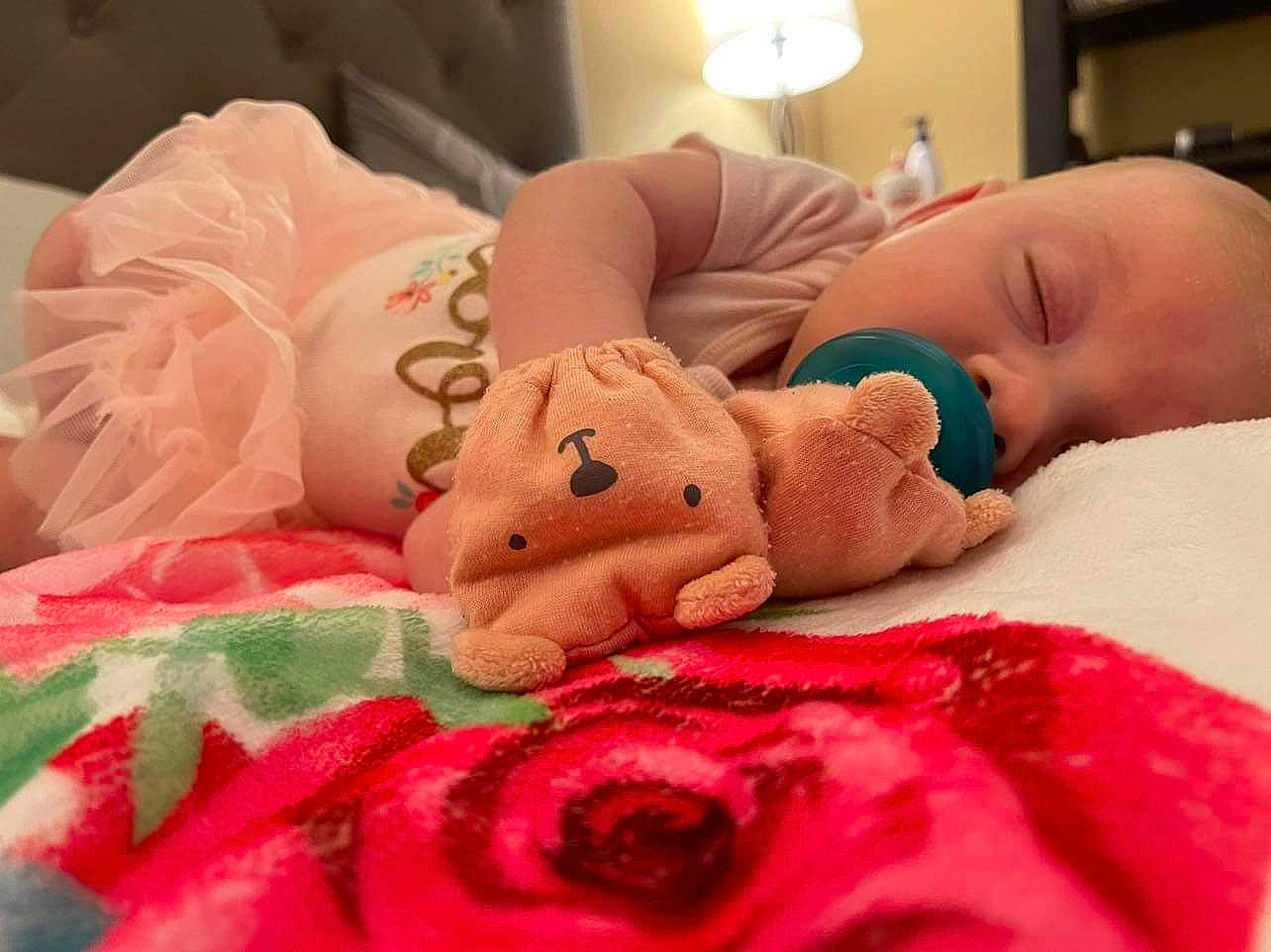Constance is registered to the contest to win money with this photo: abdomen, arm, art, baby, baby_sleeping, bedding, child, comfort, head, human_body, leg, linens, nail, person, pink, plush, room, skin, stuffed_toy, textile