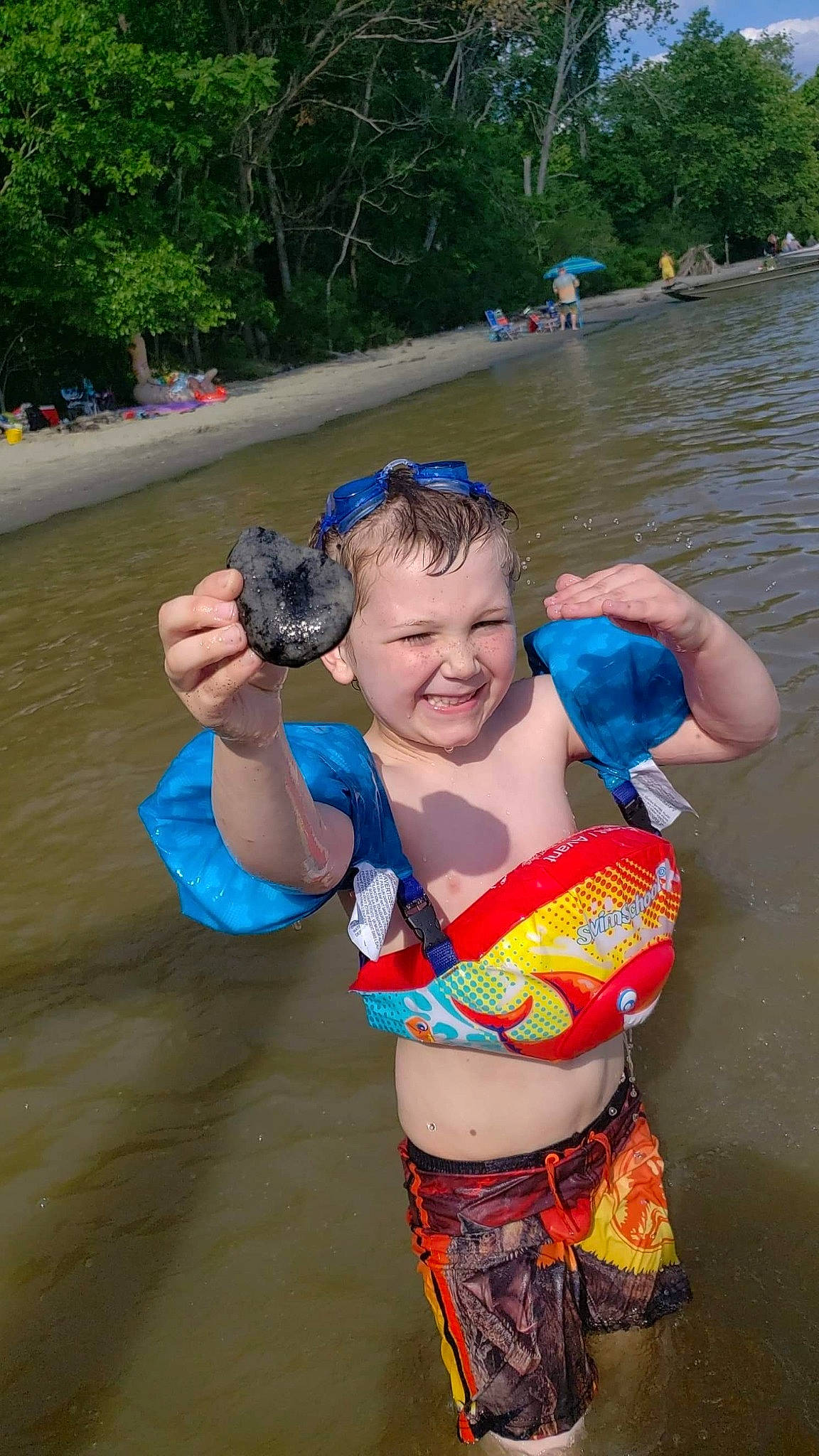 Drew is registered to the contest to win money with this photo: abdomen, costume, finger, fun, joy, navel, person, recreation, trunk, vacation, water