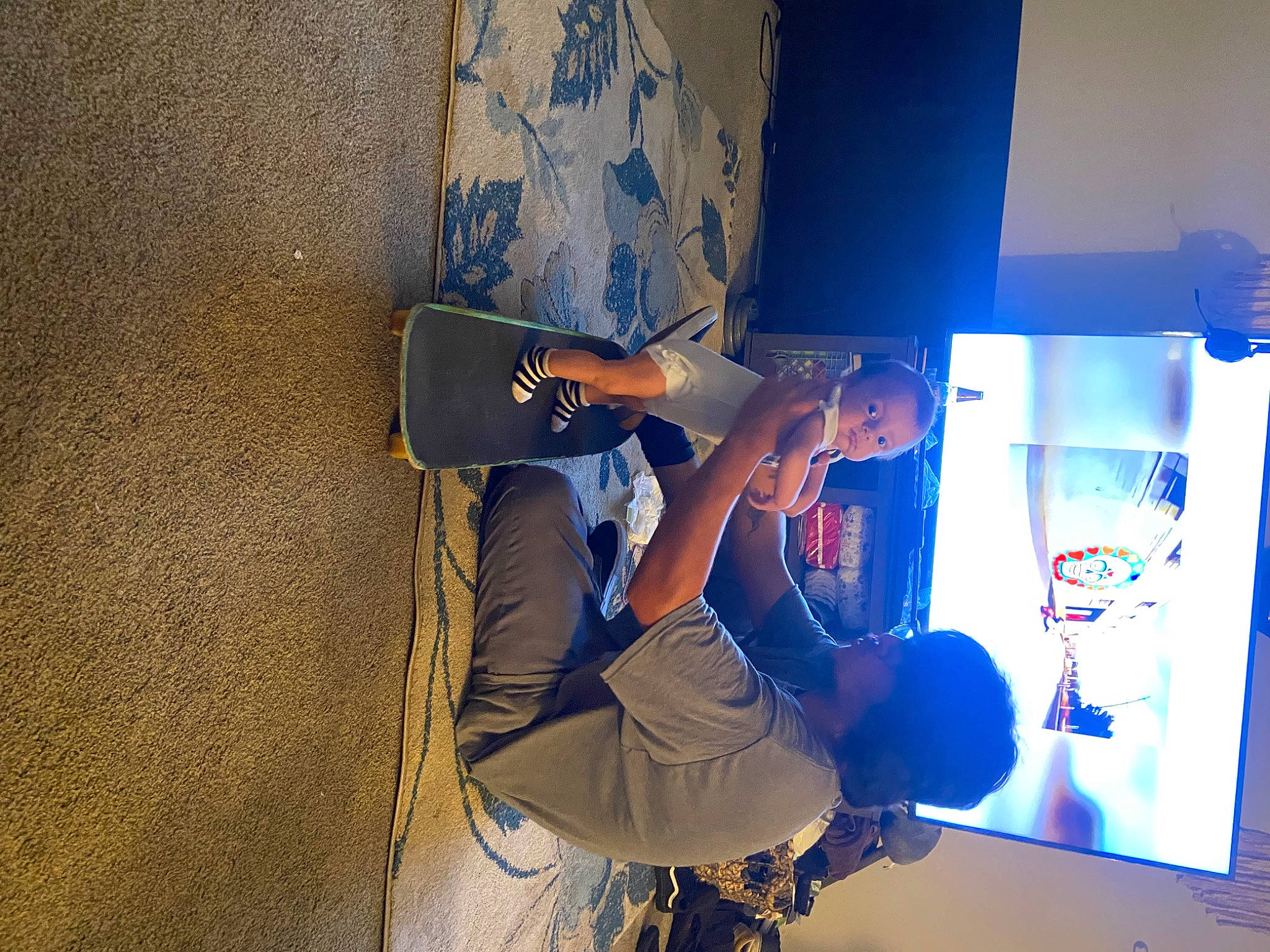 Giles is registered to the contest to win money with this photo: adventure, advertising, chair, display_device, elbow, electric_blue, entertainment, event, flat_panel_display, fun, leisure, performance, performing_arts, person, room, space, t_shirt, visual_arts, world