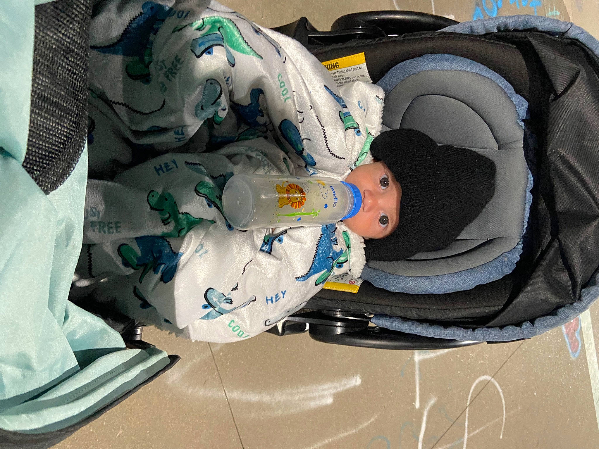 Giles is registered to the contest to win money with this photo: baby, baby_products, baby_safety, baby_sleeping, baby_toddler_clothing, carmine, child, comfort, hat, head, headwear, linens, nap, pattern, person, plastic, room, sitting, sleep, sleeve