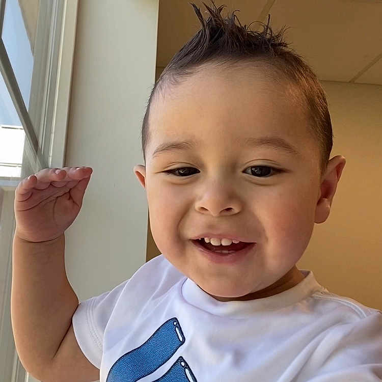 Wesley is registered to the contest to win money with this photo: baby, blackhair, bodypart, clothing, face, finger, hair, hand, happy, head, mohawkhairstyle, mouth, person, photography, portrait, shirt, shoulder, smile, t_shirt, teeth