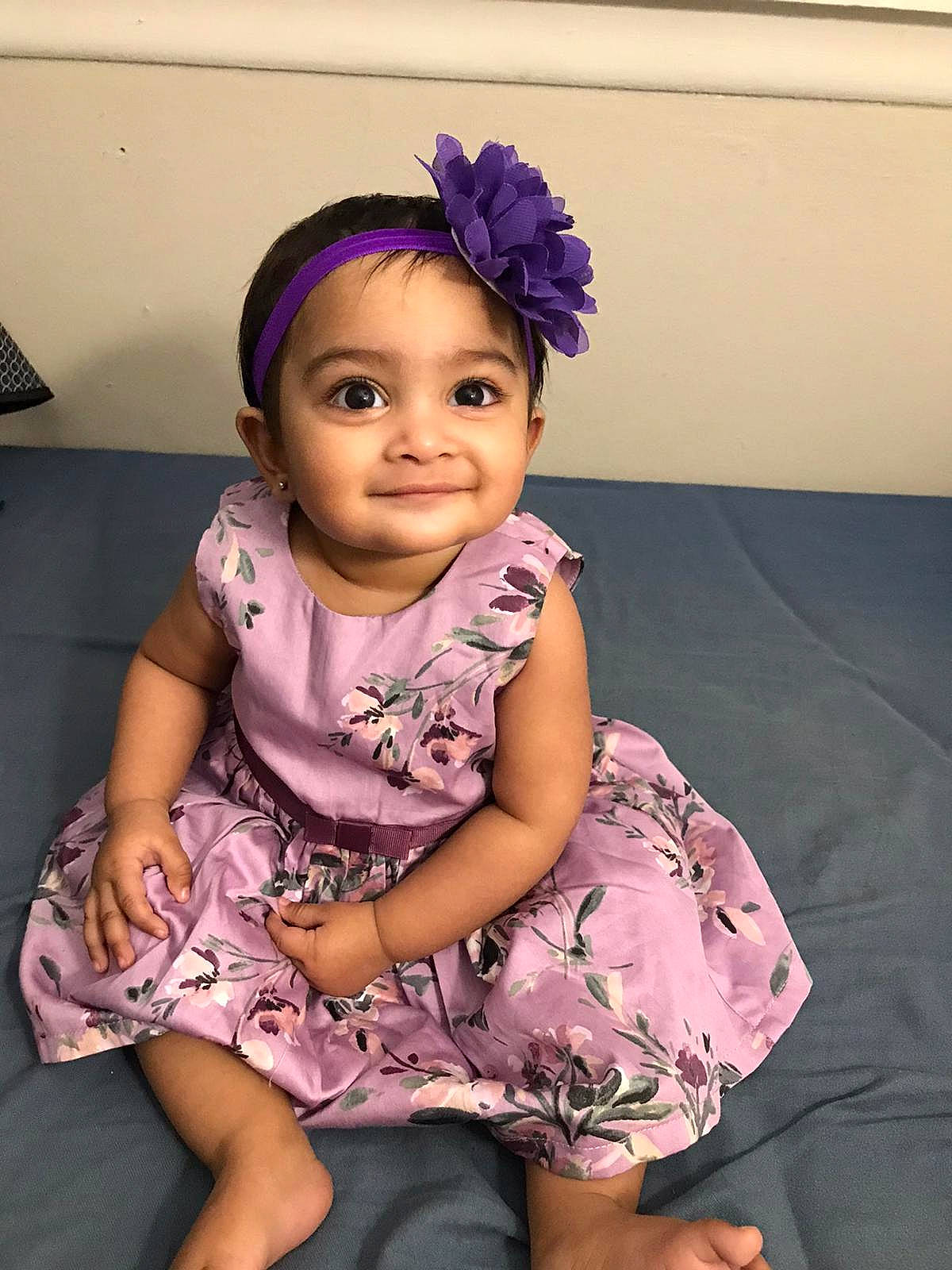 Shanaya joined the competition — help win amazing prizes! child, child_model, fashion_accessory, hair_accessory, hairstyle, headband, headgear, headpiece, joy, person, pink, purple, sitting, smile, toddler