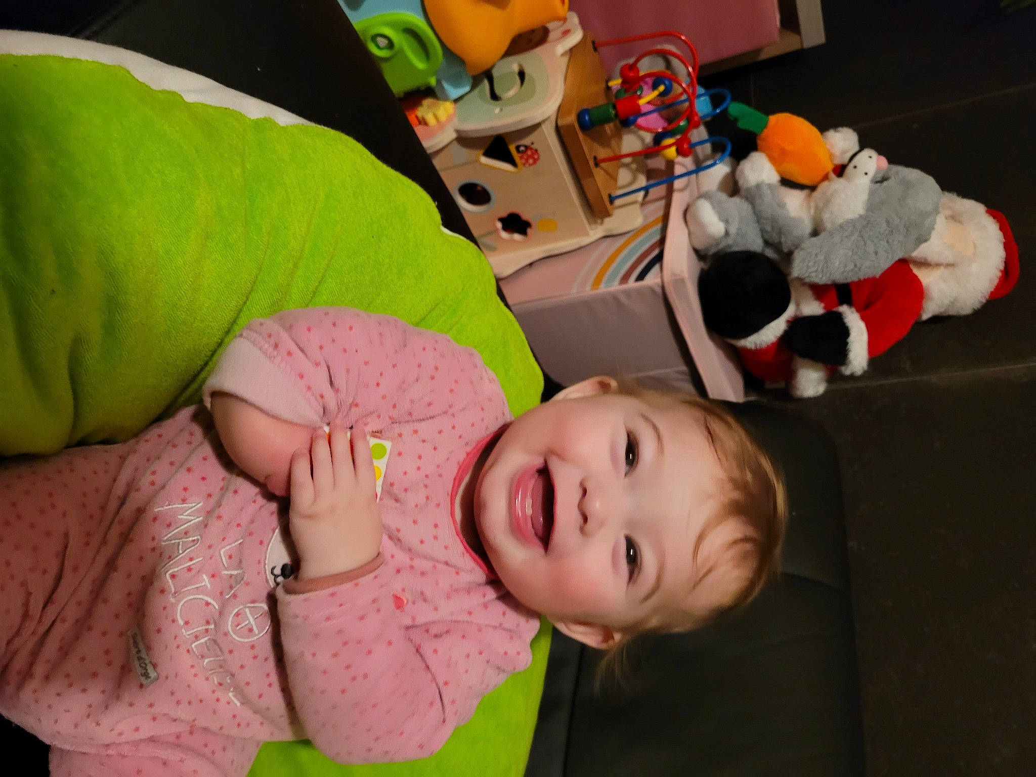 Hailey participe au concours pour gagner de l'argent avec cette photo : baby, baby_products, baby_toddler_clothing, cheek, child, comfort, flooring, fun, gesture, grass, happy, joy, person, plastic, plush, room, sitting, smile, stuffed_toy, toddler