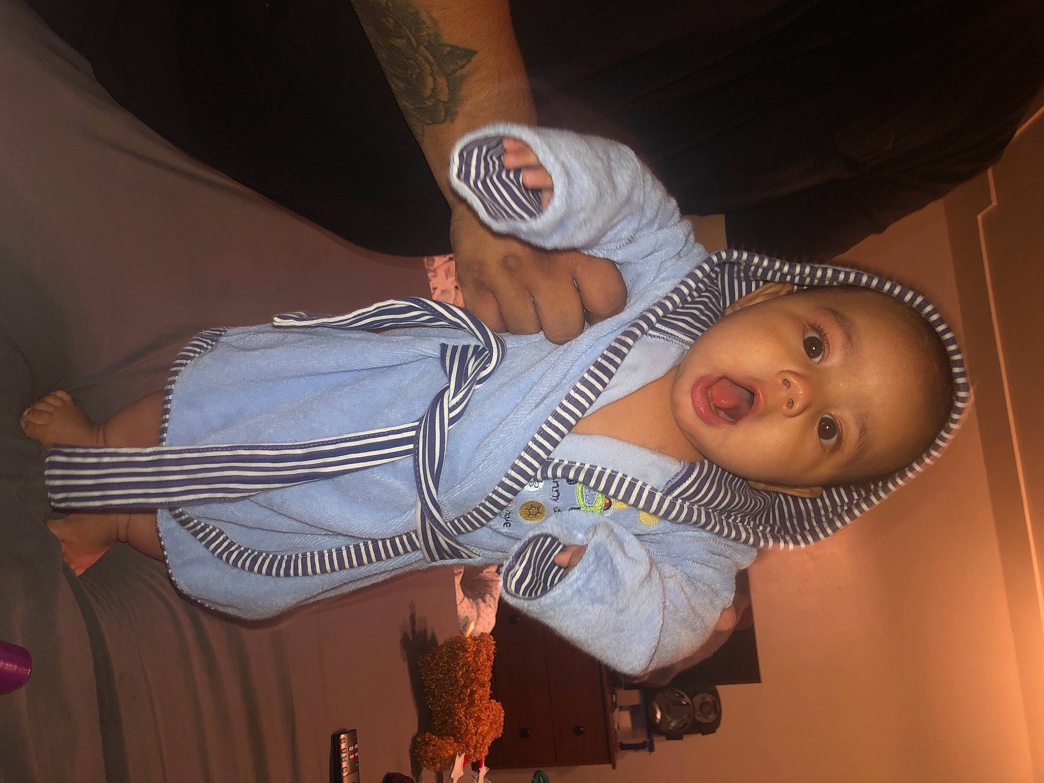 Andre joined the competition — help win amazing prizes! baby, child, elbow, entertainment, event, flesh, fun, hat, human_body, performing_arts, person, room, sleeve, smile, surprise, thumb, toddler, wrist