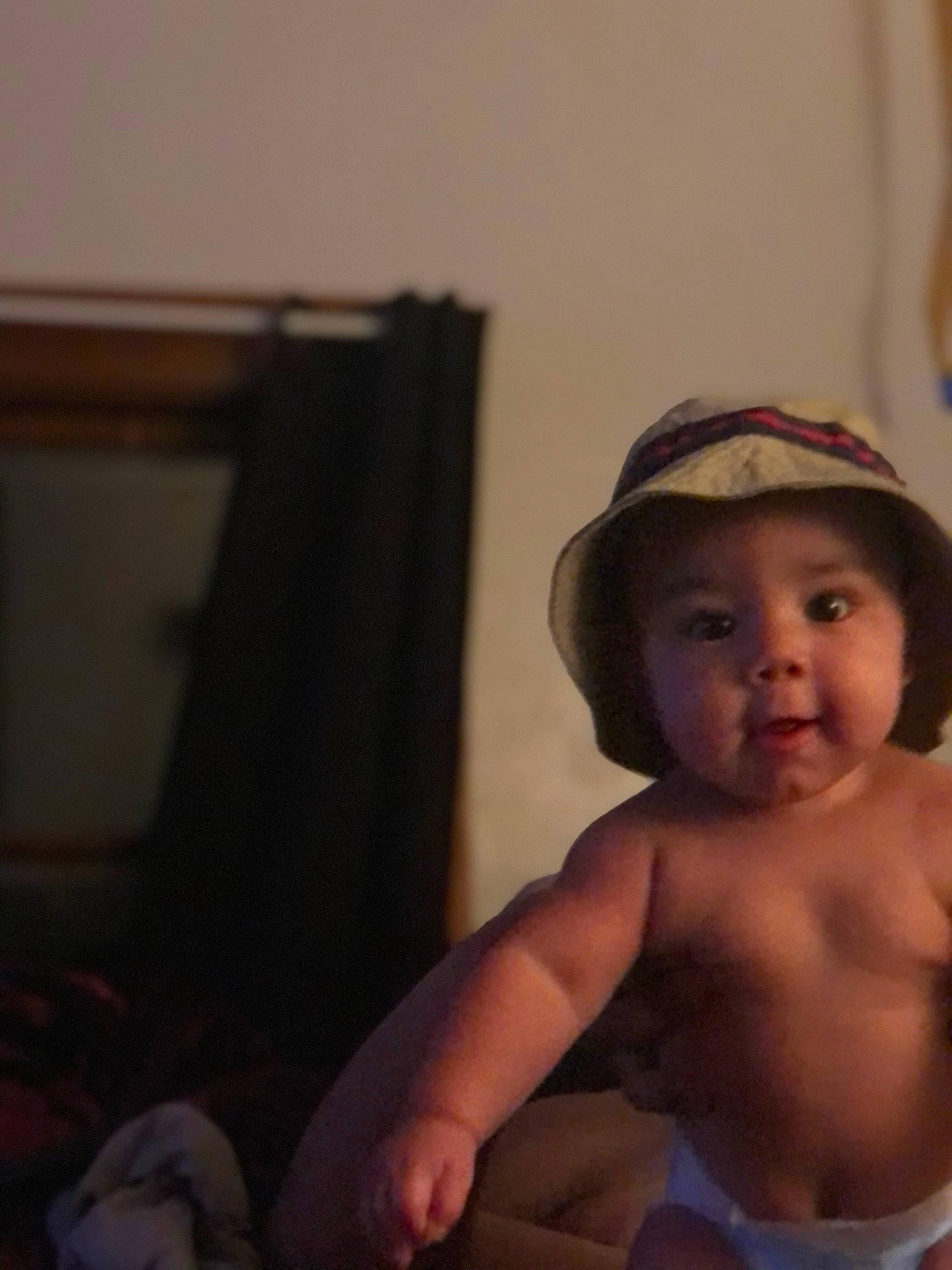 Andre is registered to the contest to win money with this photo: abdomen, baby, cap, cheek, chest, comfort, ear, elbow, eyebrow, finger, flash_photography, fun, happy, headwear, lip, nose, person, skin, smile, thumb